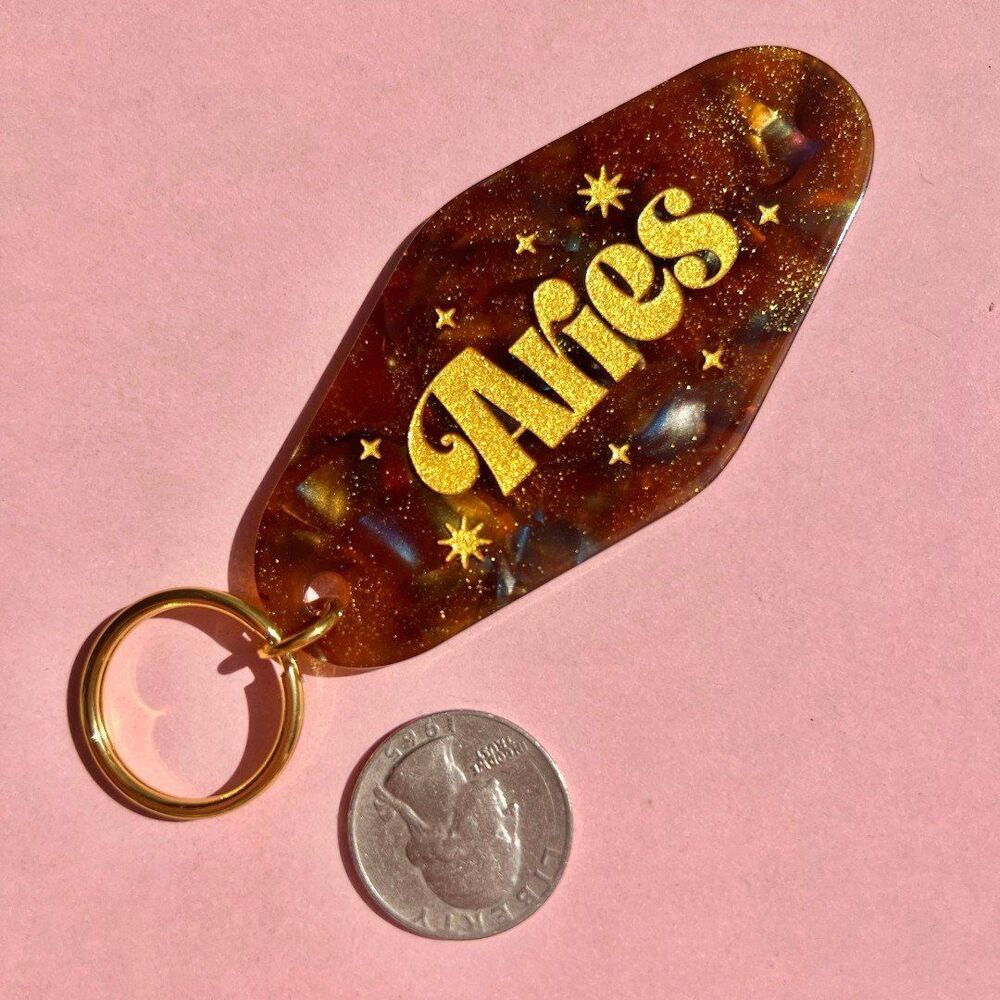 Aries Horoscope Engraved Gold Glitter Resin Hotel Style Keychain